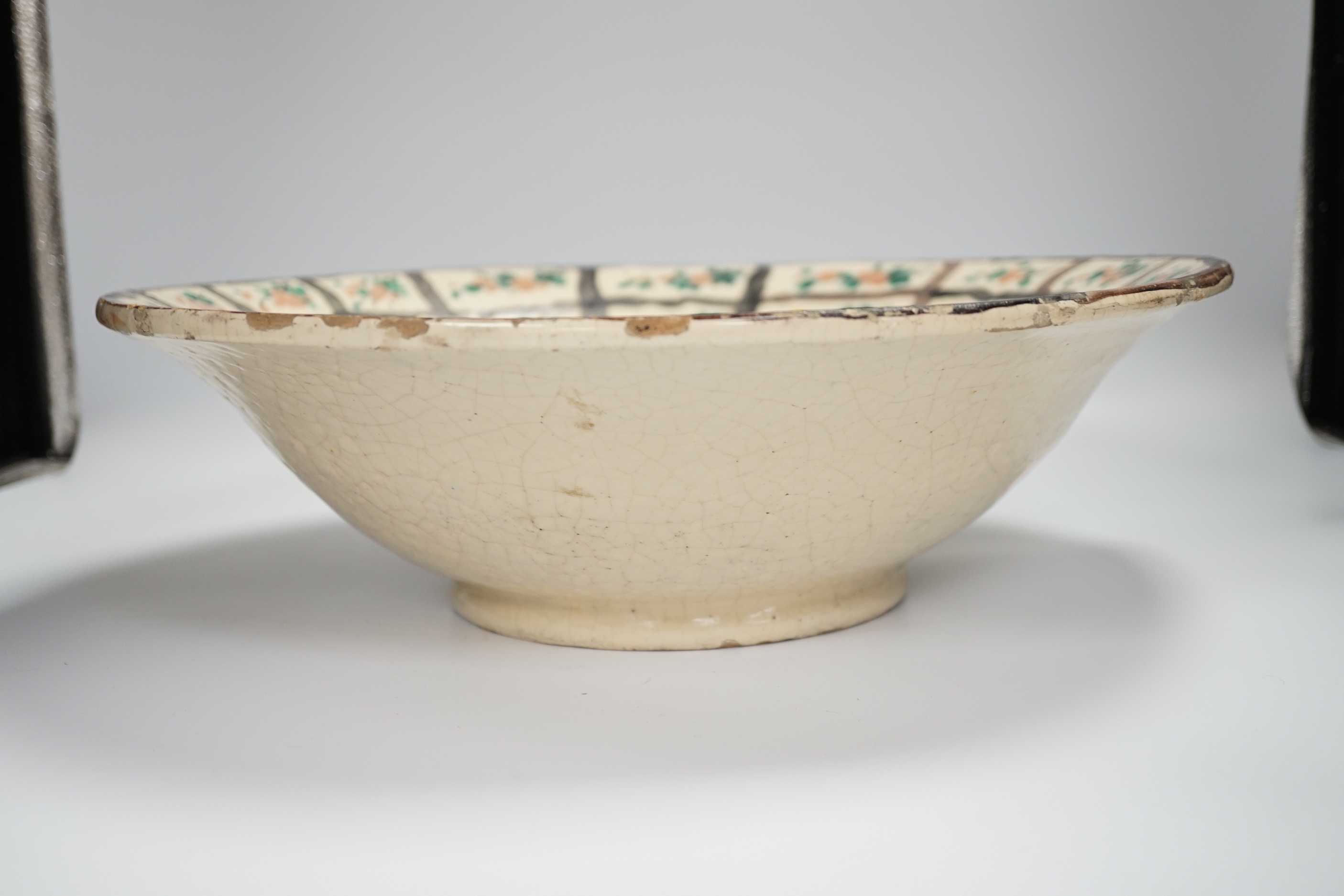 A large Persian glazed pottery bowl, 39cm diameter